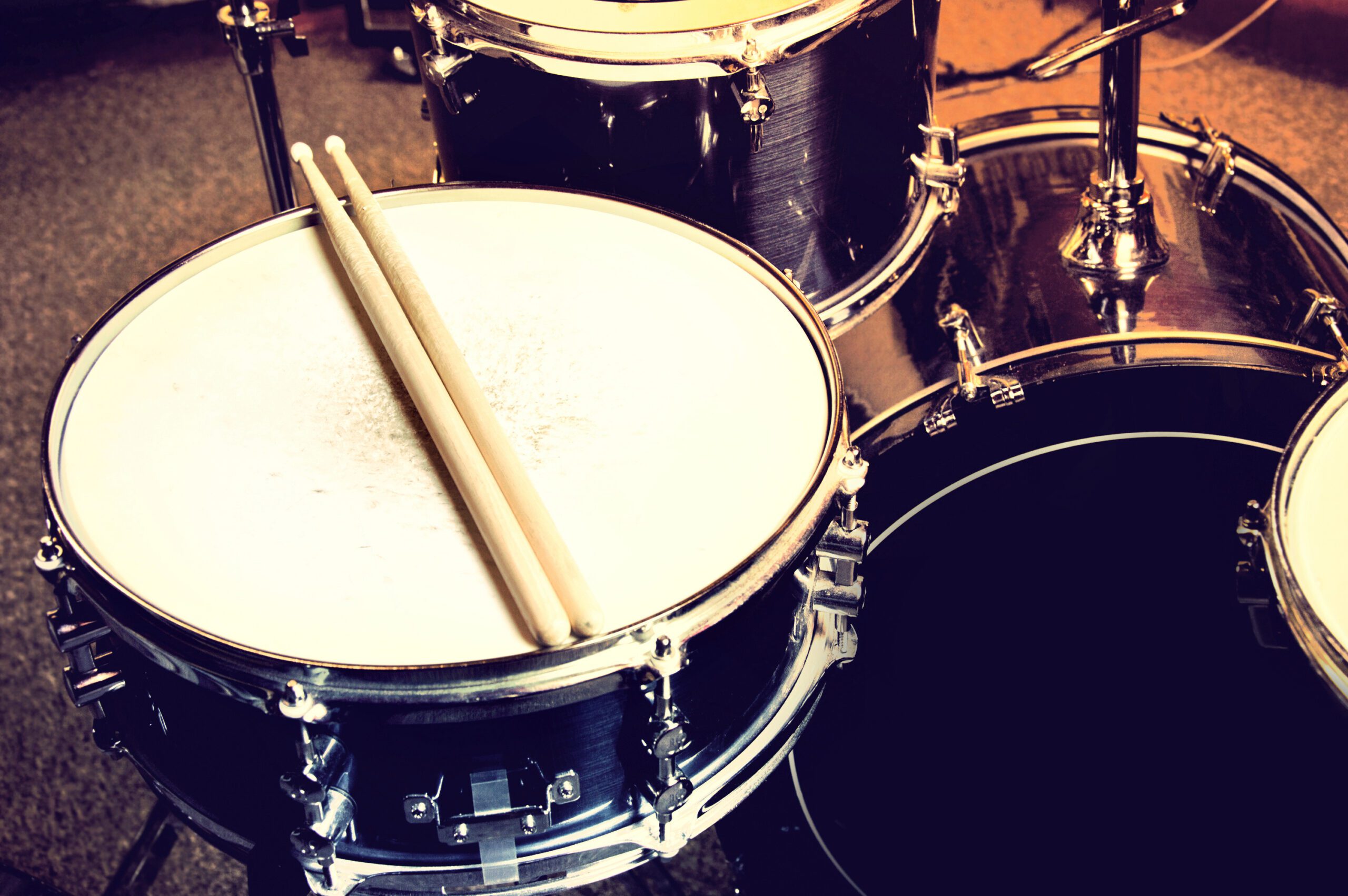 Picture of Drums and Drumsticks Lying on Snare Drum